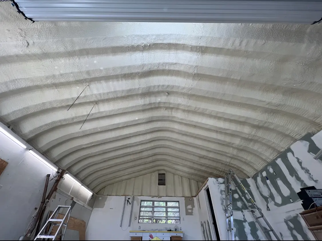 Spray polyurethane foam applied to the underside of a metal roof deck in Arden Hills
